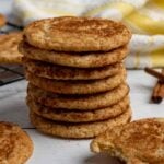 Close up of snickerdoodle cookies stacke on top of each other.