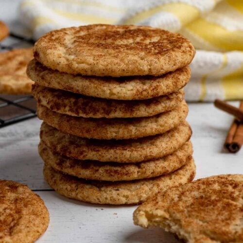 Close up of snickerdoodle cookies stacke on top of each other.