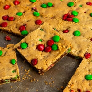 M&M cookie bars cut out on a sheet pan.