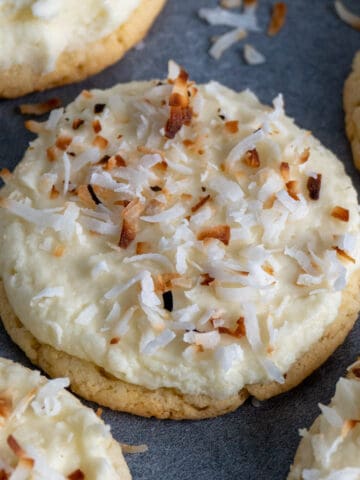 Coconut cake mix cookies with toasted coconut on top.