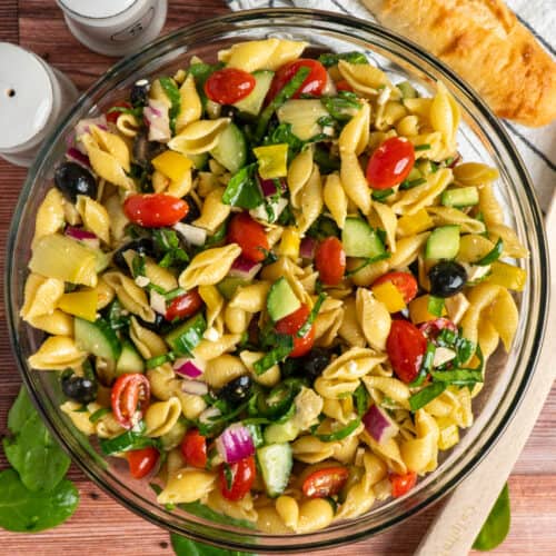 Balsamic pasta salad in a clear bowl.