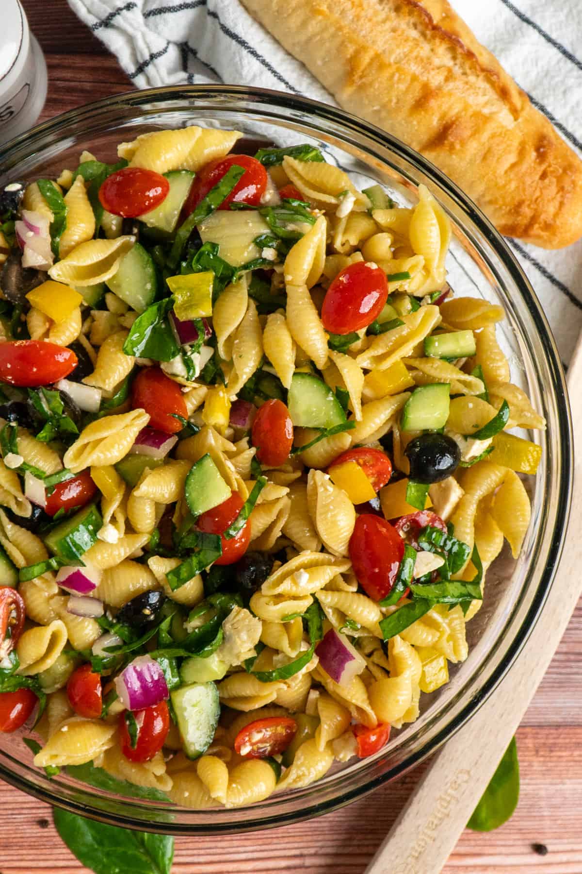 Balsamic pasta salad in a clear bowl.