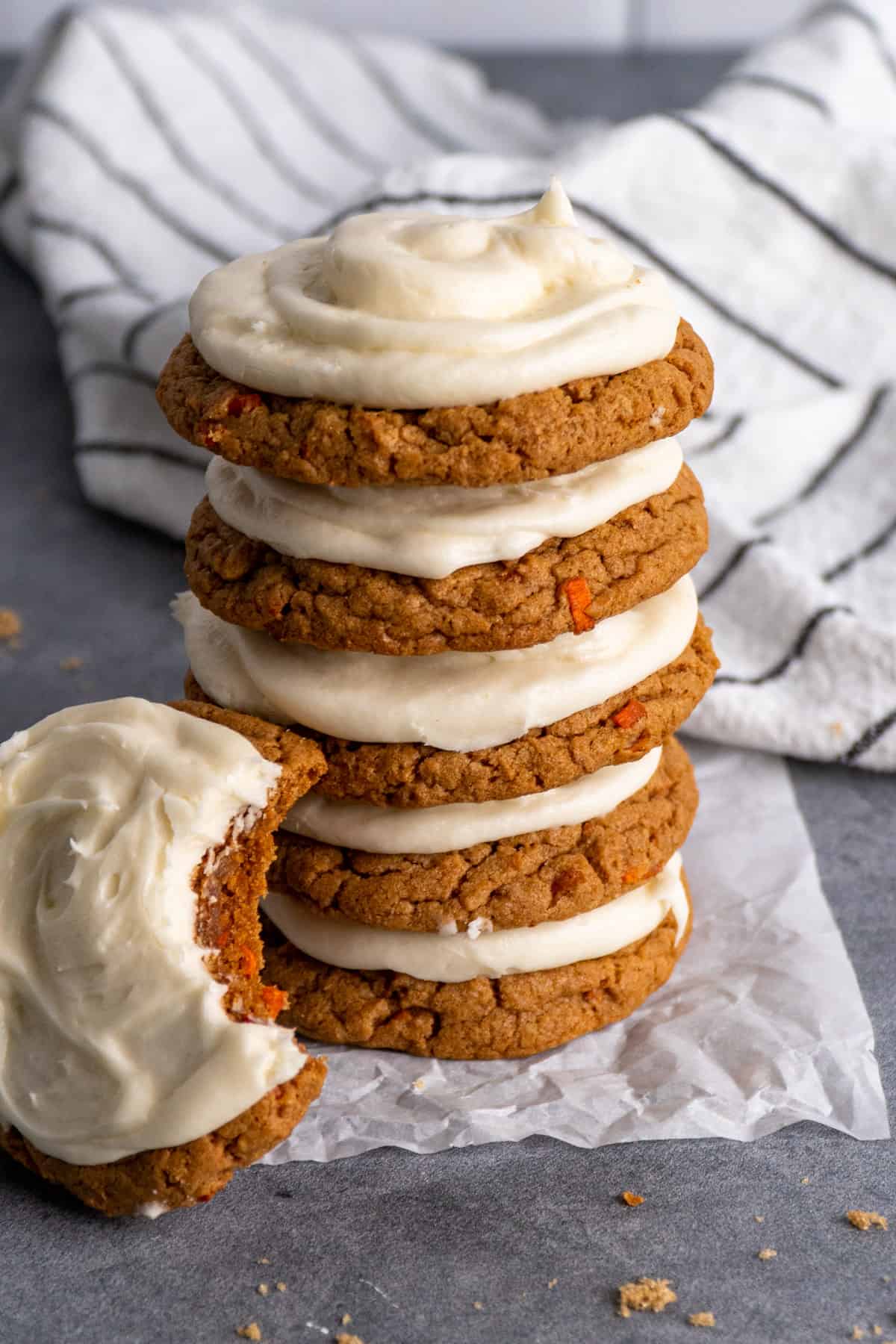 Carrot cake mix cookies stacked on top of each other.