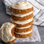 Carrot cake mix cookies stacked on top of each other.