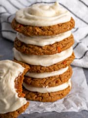 Carrot cake mix cookies stacked on top of each other.
