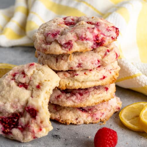 Raspberry lemonade cookies stacked on top of each other.