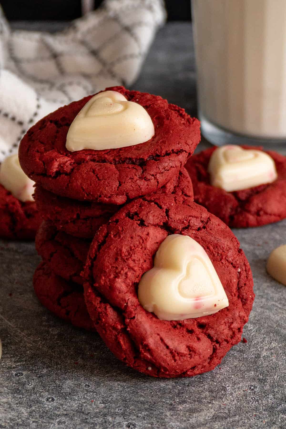 Red velvet cookies stacked on top of each other.