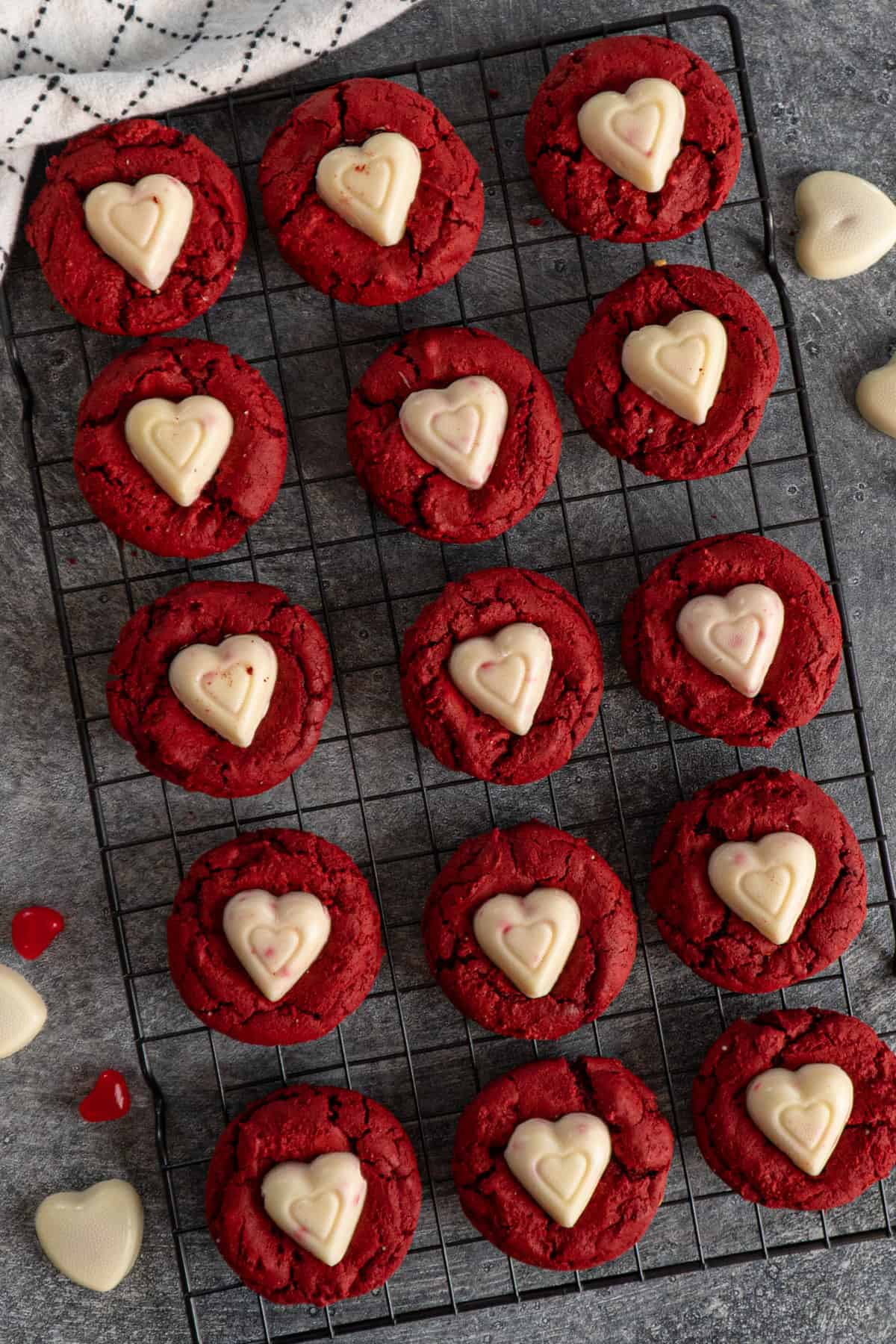 Valentines day cookies on a cooling rack.