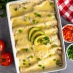 White chicken enchiladas in a baking dish.