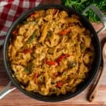 Creamy chicken fajita pasta in a skillet.