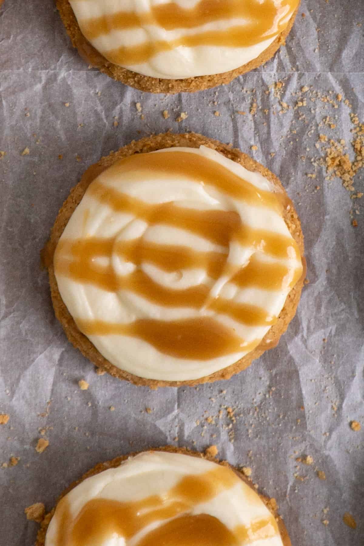 Close up of a Crumble salted caramel cheesecake cookie.