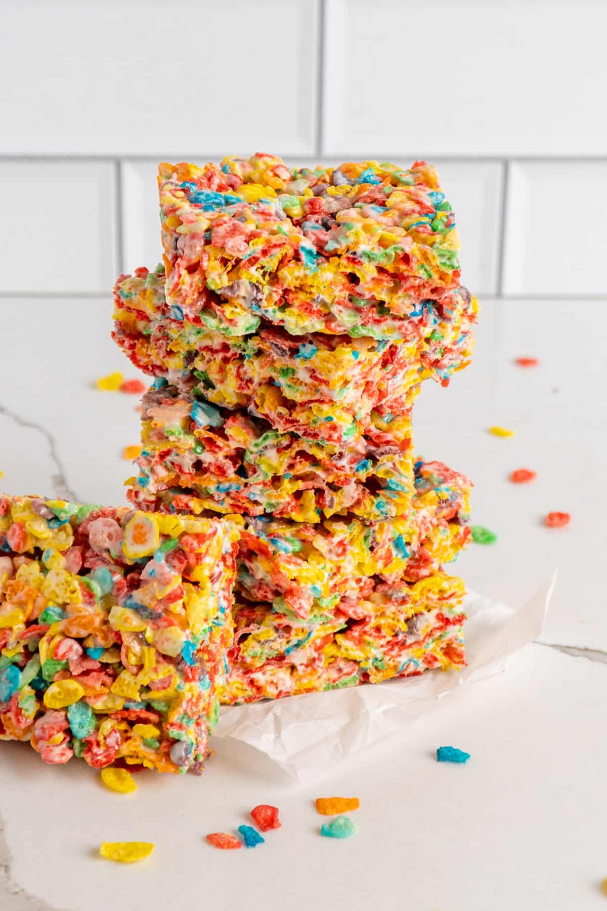 Fruity pebbles treats stacked on top of each other.