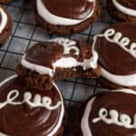 Hostess cupcake cookies with a bite taken out of one.