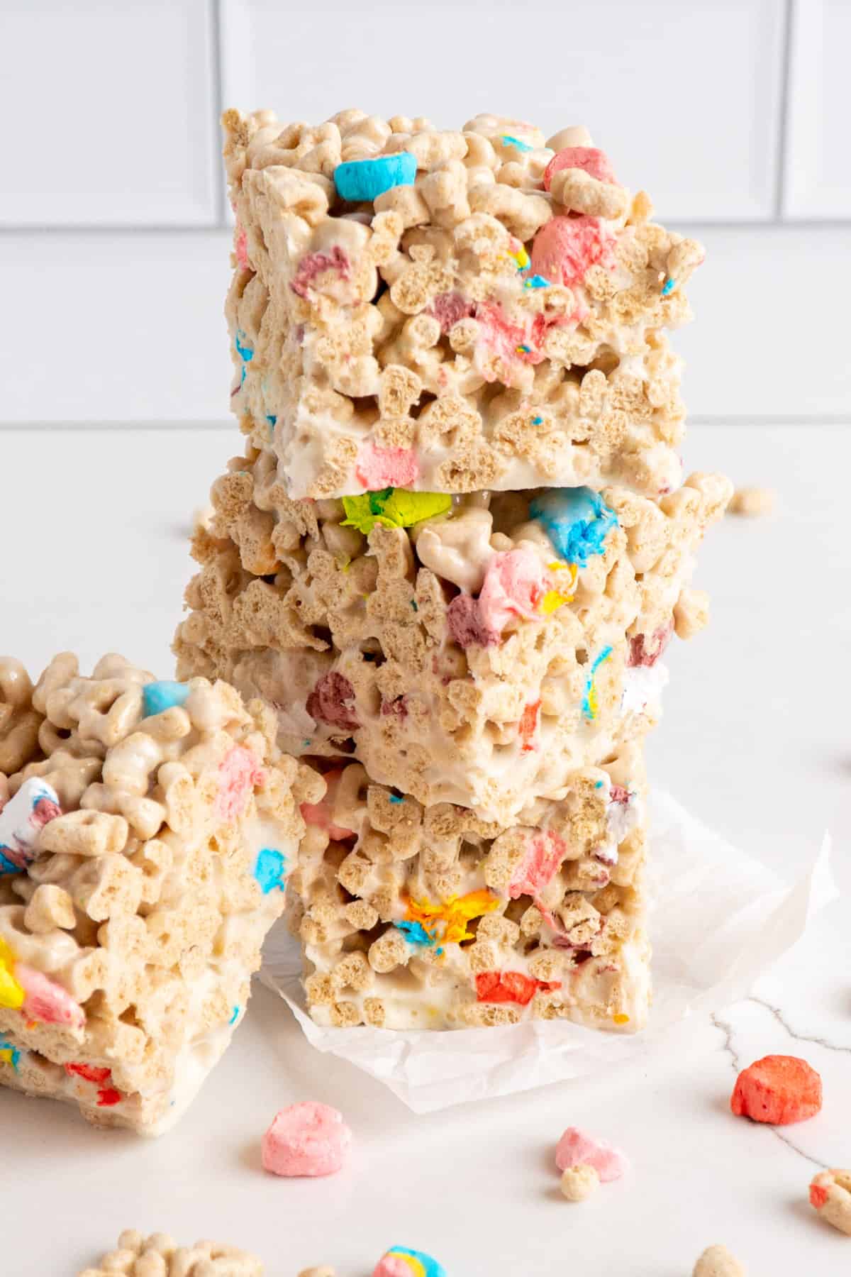 Lucky charm rice krispie treats stacked on top of each other.