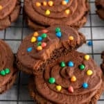 Close up of a cosmic brownie cookie with a bite taken out of it.