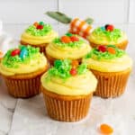 Close-up of a Easter egg cup cake with jelly beans on top.