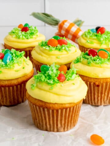 Close-up of a Easter egg cup cake with jelly beans on top.