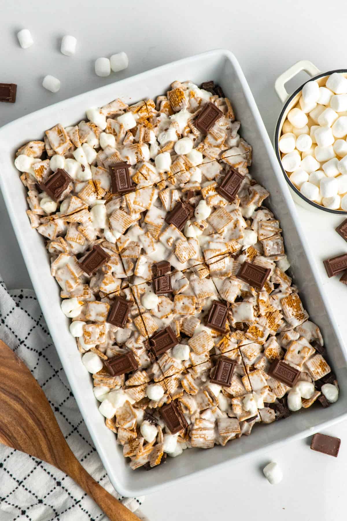 Golden Graham s'mores bars in a white baking dish!