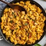 Overhead look at marry me chicken tortellini in a skillet.