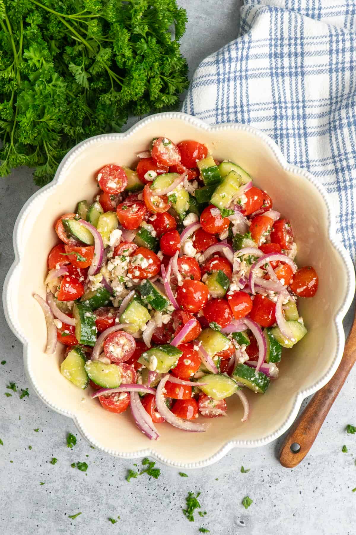 All the veggies mixed together in a white bowl.