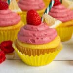 Close up of a raspberry lemonade cupcake.