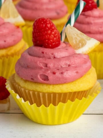 Close up of a raspberry lemonade cupcake.