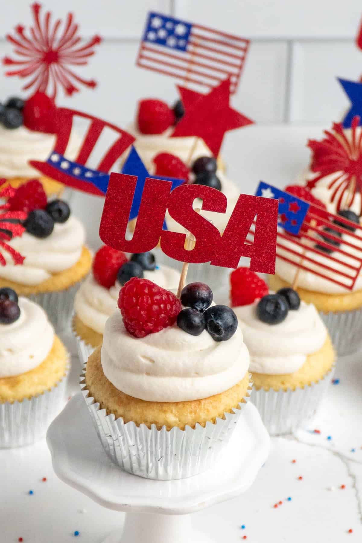 Close up of 4th of July cupcakes with holiday decor.