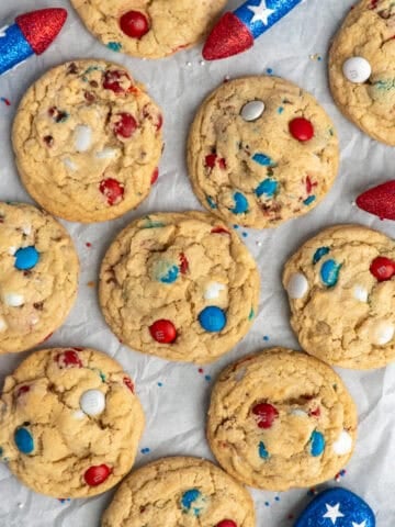 Overhead look at 4th of July cookies on parchment paper.