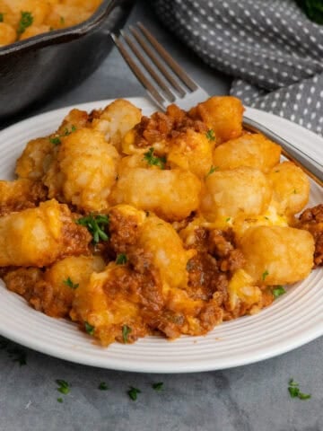 Slow cooker sloppy joe casserole on a white plate.