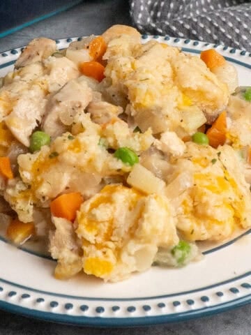 Chicken pot pie casserole on a plate ready to eat.
