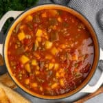 Vegetable beef soup in a dutch oven ready to be served.