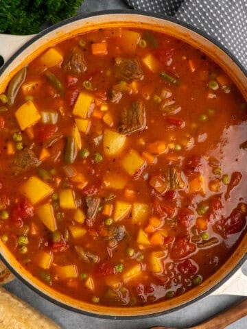 Vegetable beef soup in a dutch oven ready to be served.