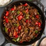 Pepper steak in a skillet ready to be served.