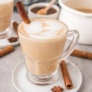 Chai latte recipe in a glass cup.