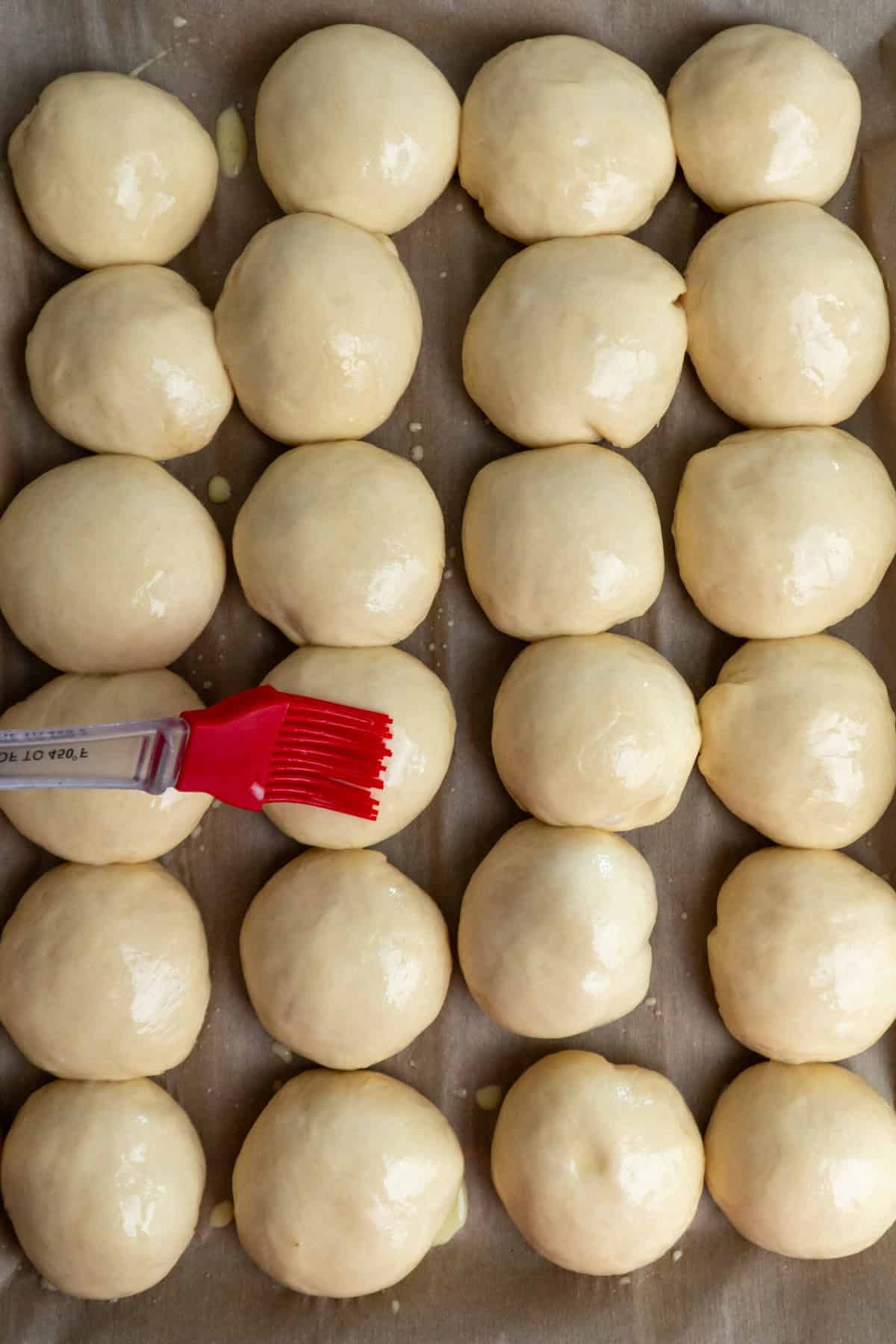 Dough balled brushed with egg wash.