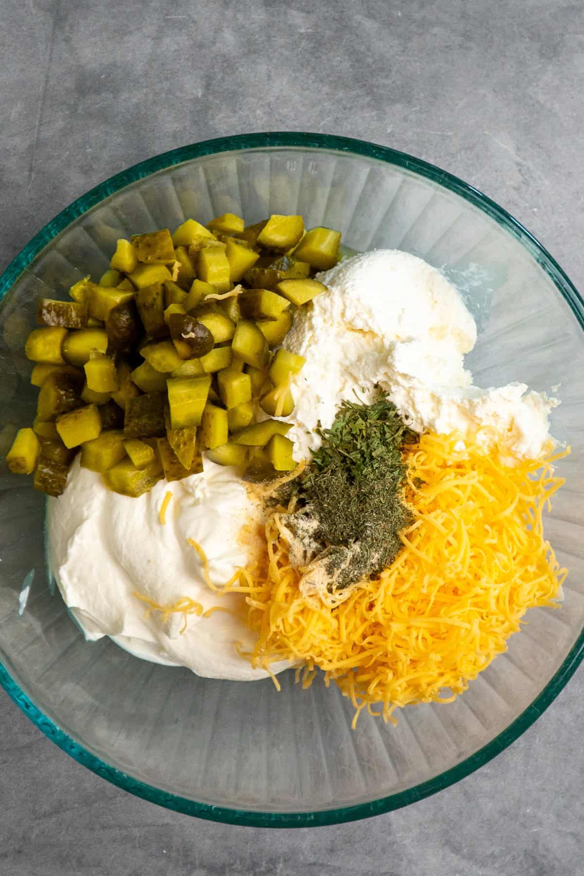 All the pickle dip ingredients combined in a bowl.