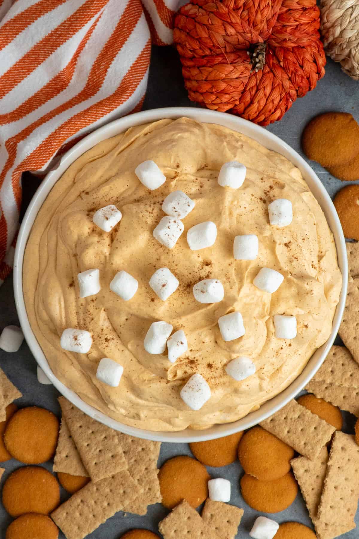 Pumpkin fluff dip served with graham crackers and nilla waffers.