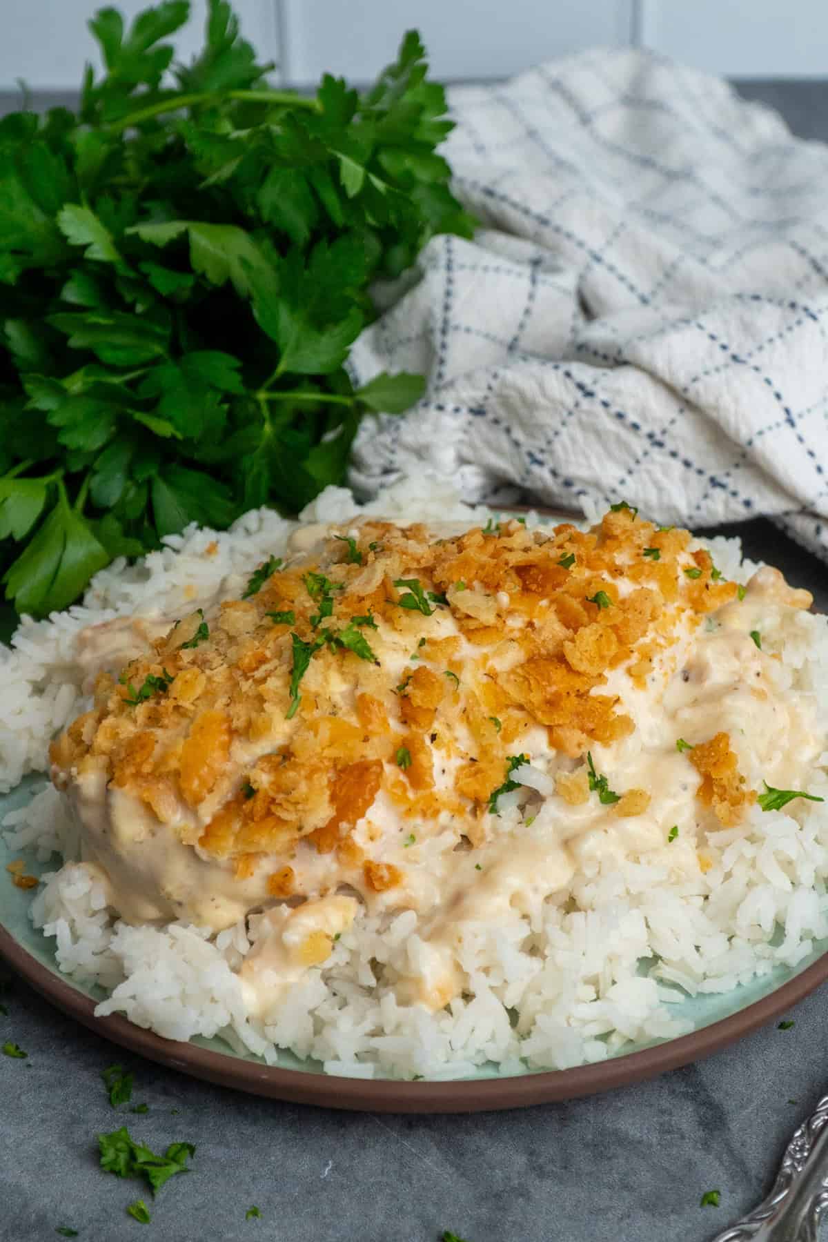Ritz cracker chicken with sauce over white rice.