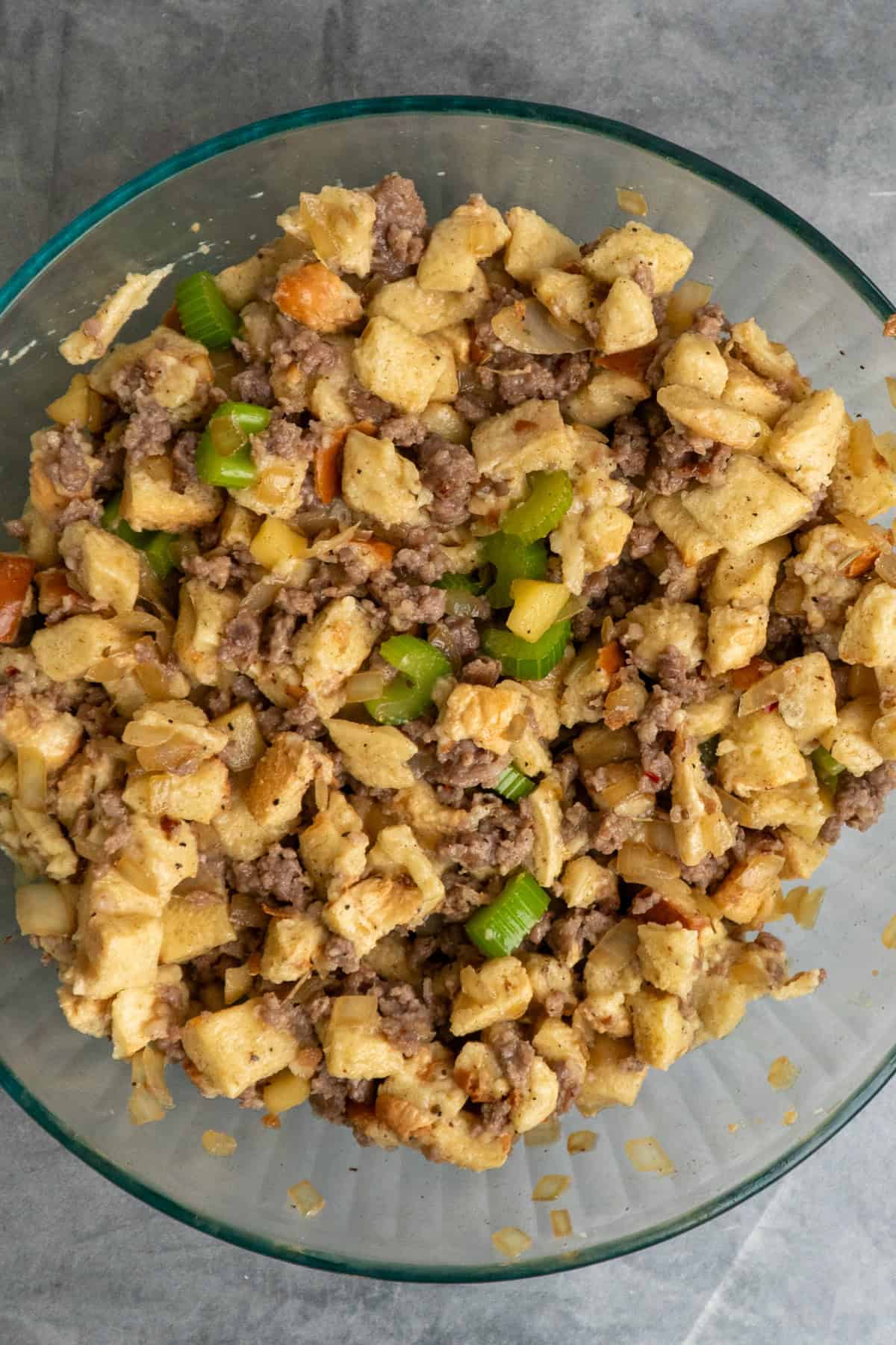 Breadcrumbs, vegetables and egg mixture mixed together in a bowl.