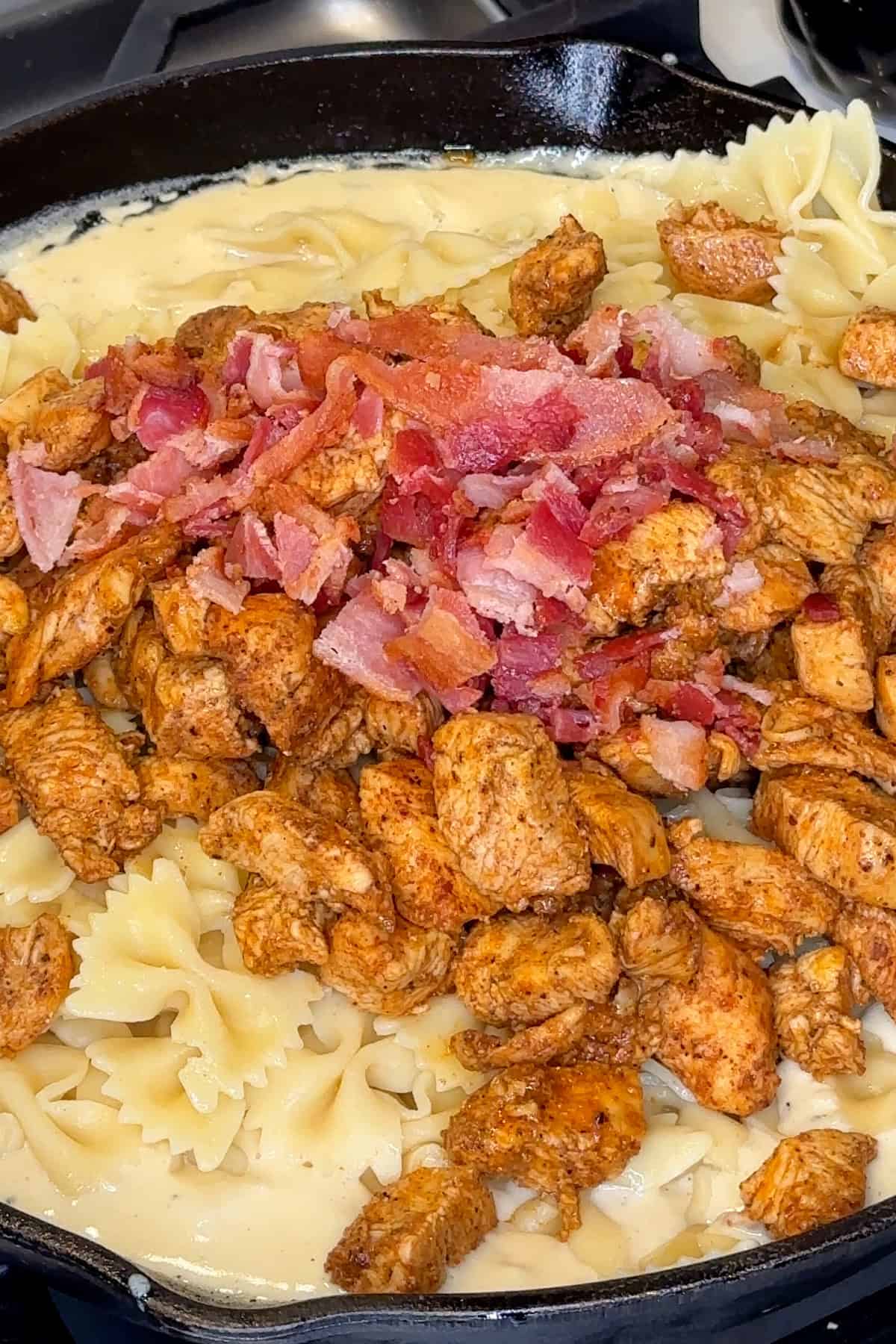 Cooked pasta, chicken and bacon added to the ranch sauce.