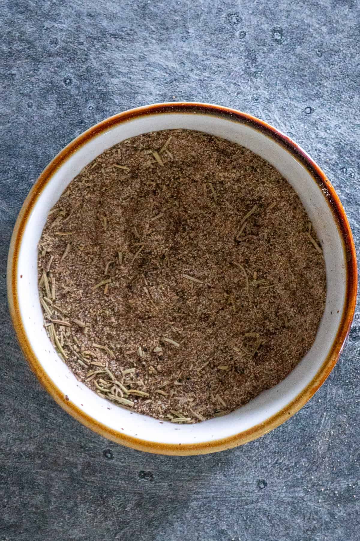 Seasonings mixed together in a bowl.