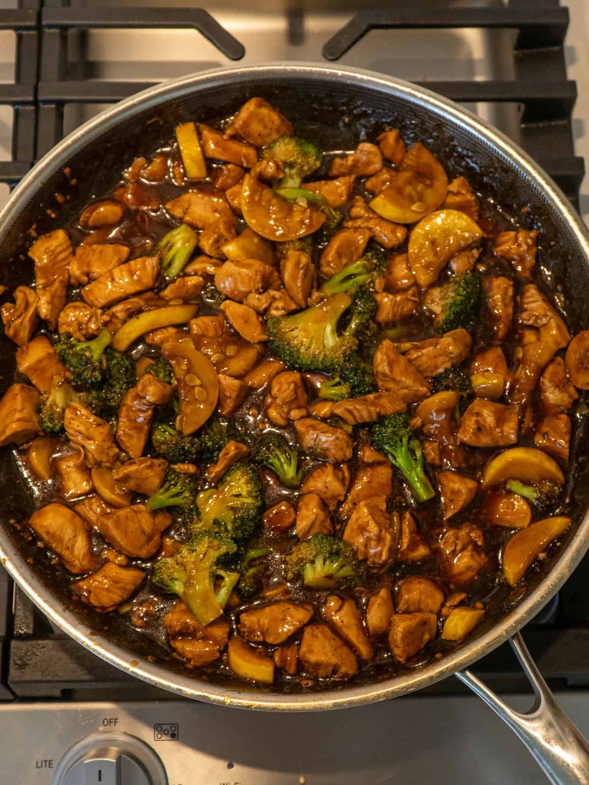 Cooked chicken and homemade teriyaki sauce added to the cooked vegetables.